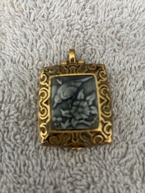 Beautiful bird on a flower pendant,